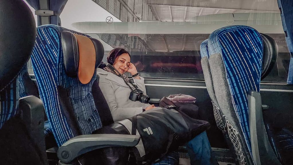Woman sitting on a bus bound for Colonia del Sacramento in Uruguay.